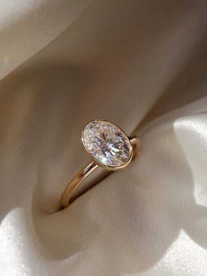 Martha- 1.20 CT Oval Bezel Moissanite Ring