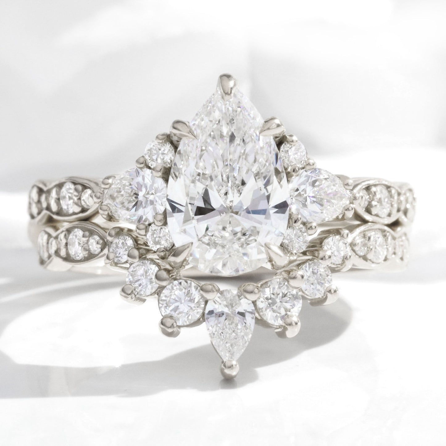 Hannah- 2.0 CT Pear Moissanite Cluster & Pave Bridal Ring Set